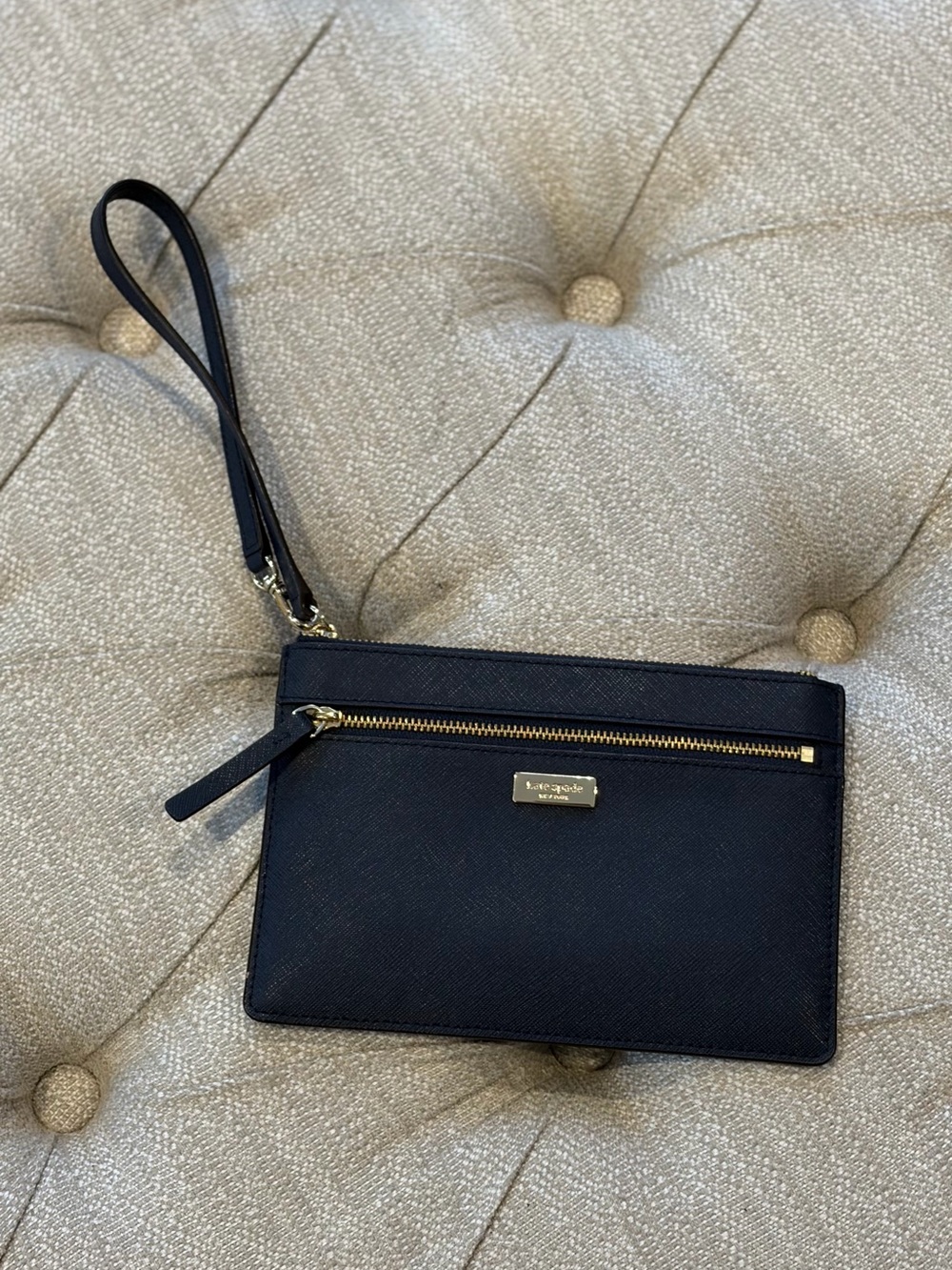 Kate Spade blue wristlet with gold hardware